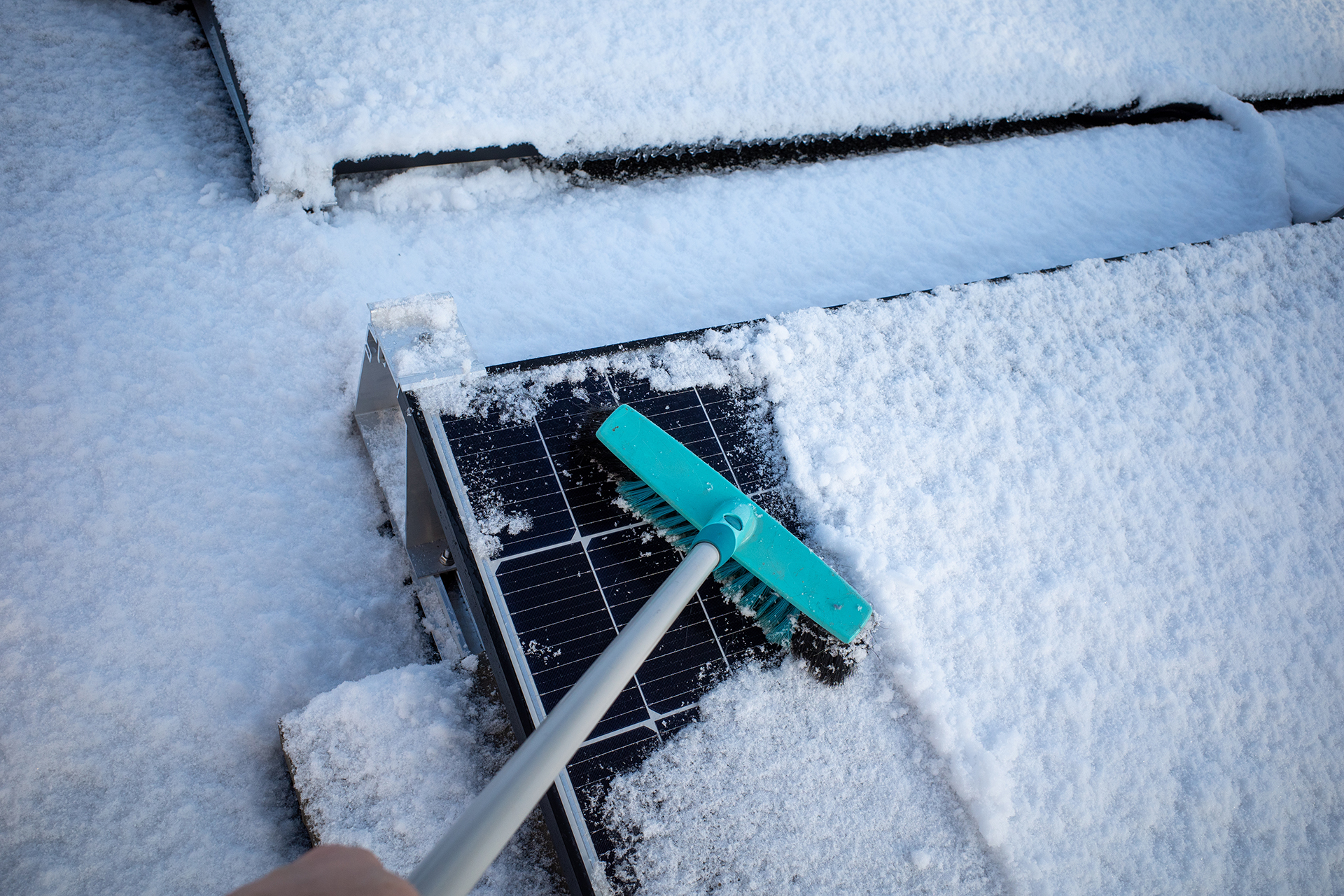 Clearing Snow from Solar Panels - Is it worth it? 