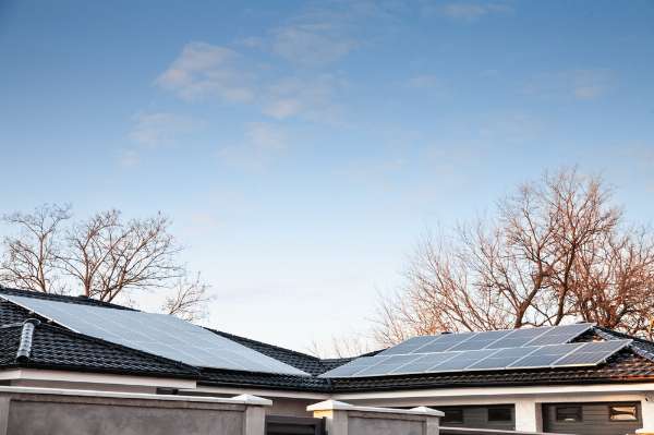 Dueling residential solar panels in this image from Shutterstock 