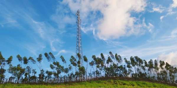 A tall phone tower in this image from Shutterstock